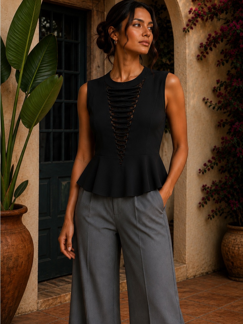 Sleeveless Black Peplum Top with Lace-Trim Detail